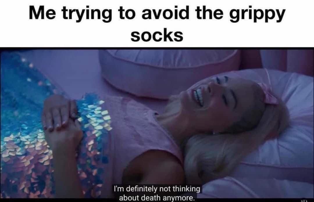 Margot Robbie as Barbie lying in bed with a caption about avoiding "grippy socks," a popular mental health classic meme.