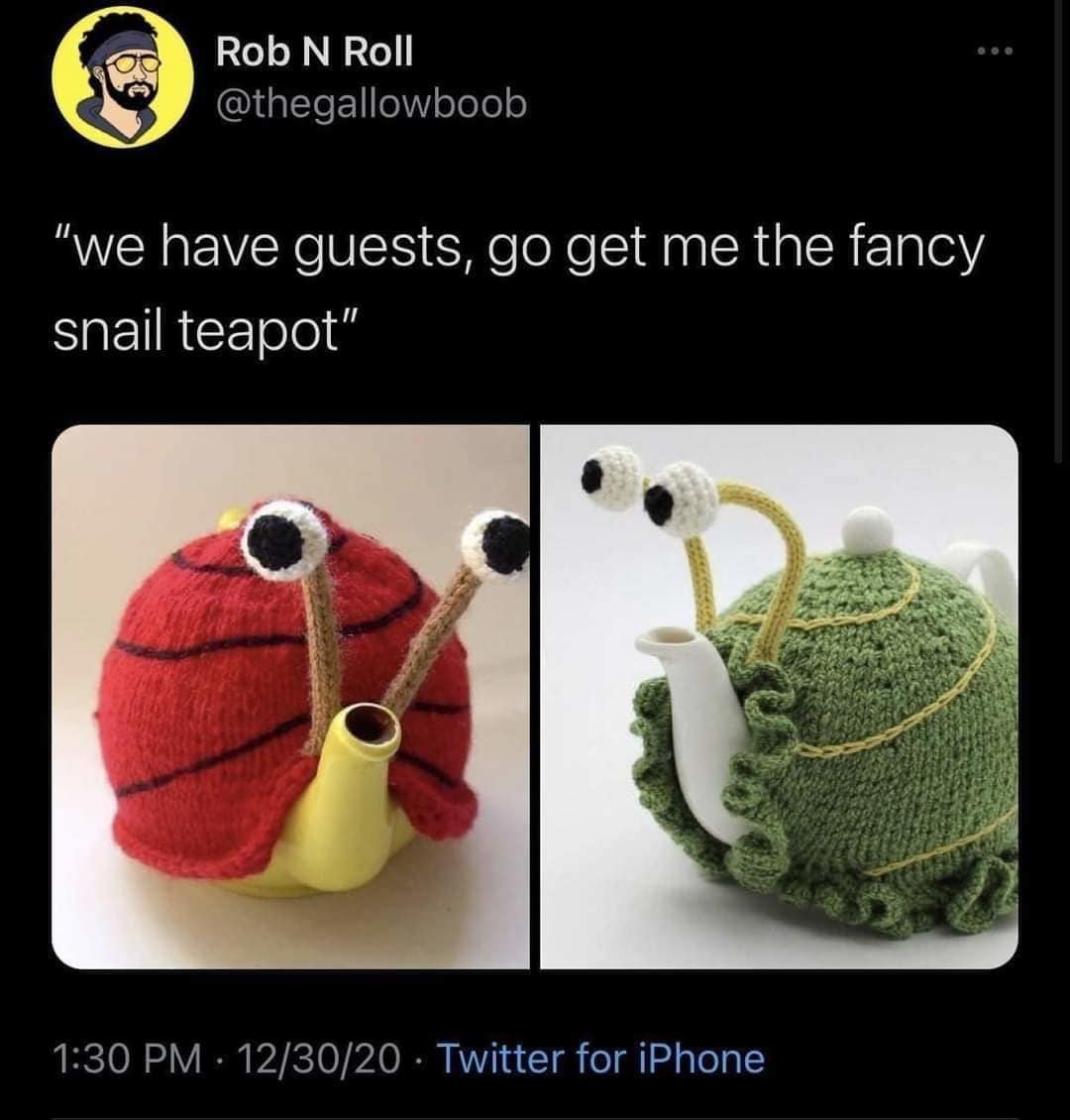 A Twitter screenshot by user @thegallowboob showcases two teapots decorated with custom hand-knitted snail-shaped tea cozies, circulating as a cute classic meme about bringing out the "fancy snail teapot" for important house guests.