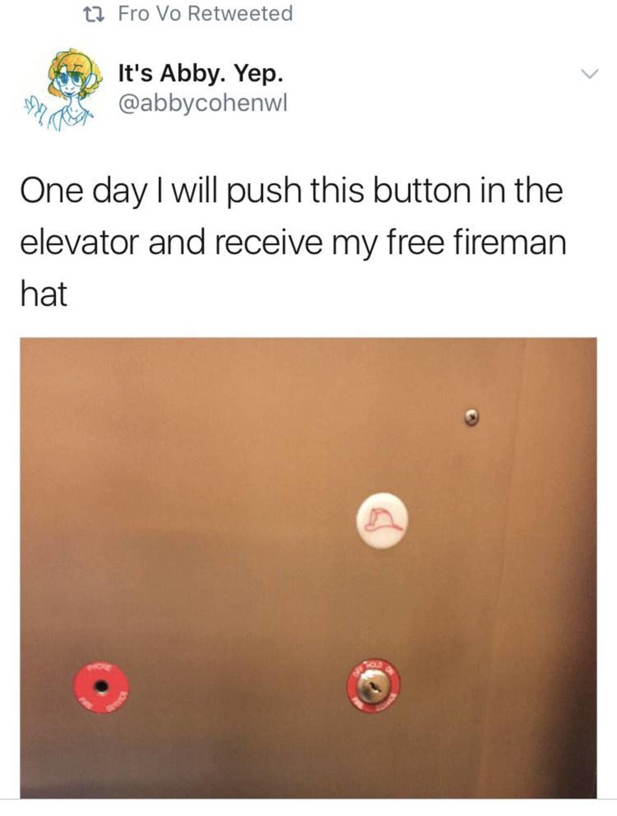 A close-up view of an elevator control panel highlights a specialized utility button adorned with a line drawing of a traditional firefighter helmet under a whimsical text tweet about expecting a free fireman hat.