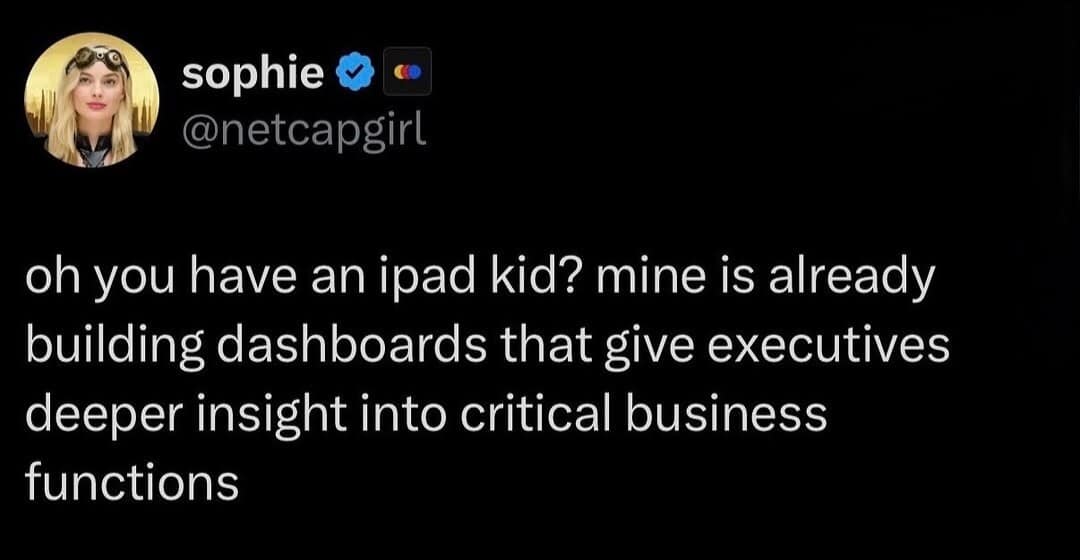 A corporate-satire classic meme tweet by @netcapgirl mocking "iPad kids" by claiming her child is already building business intelligence dashboards for executives.