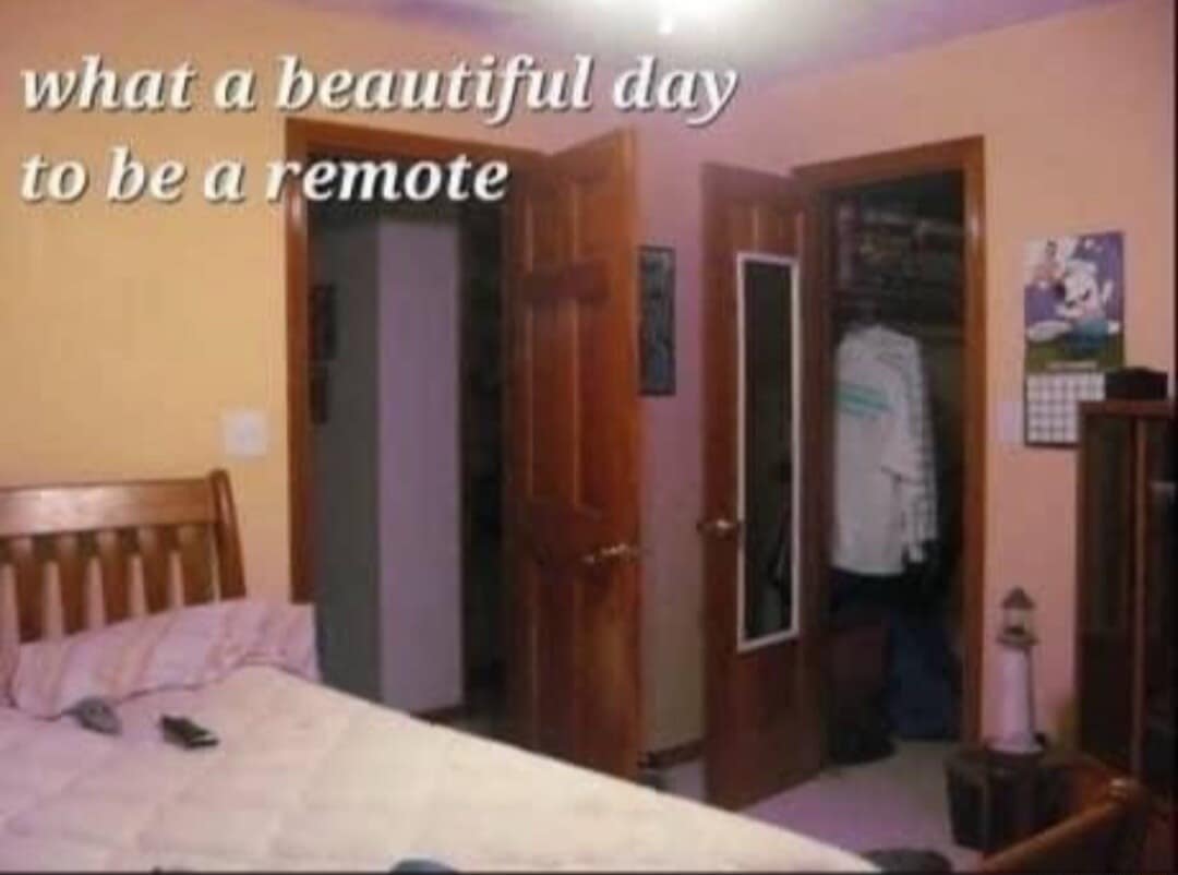 A nostalgic, low-resolution bedroom interior showing a TV remote resting on a mattress template serves as one of the best memes tracking how common household items prepare to phase out of reality.