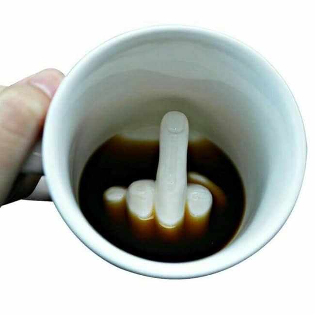 middle finger in a mug