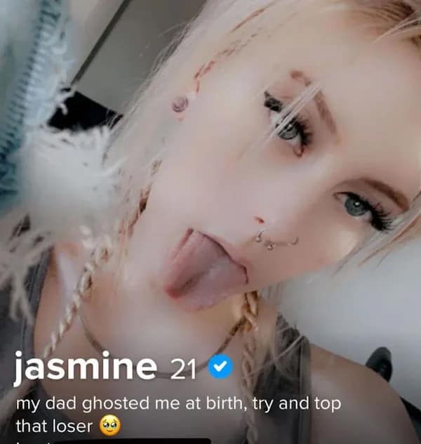 A verified cringy tinder profile selfie shows 21-year-old Jasmine sticking her tongue out, paired with a heavy trauma-dumping icebreaker challenge bio reading, "my dad ghosted me at birth, try and top that loser."