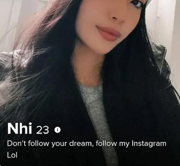 A classic smartphone crop creates a cringy tinder profile for 23-year-old Nhi, showcasing a close-up portrait of her in a beanie above a blunt social media influencer plug reading, "Don’t follow your dream, follow my Instagram Lol."