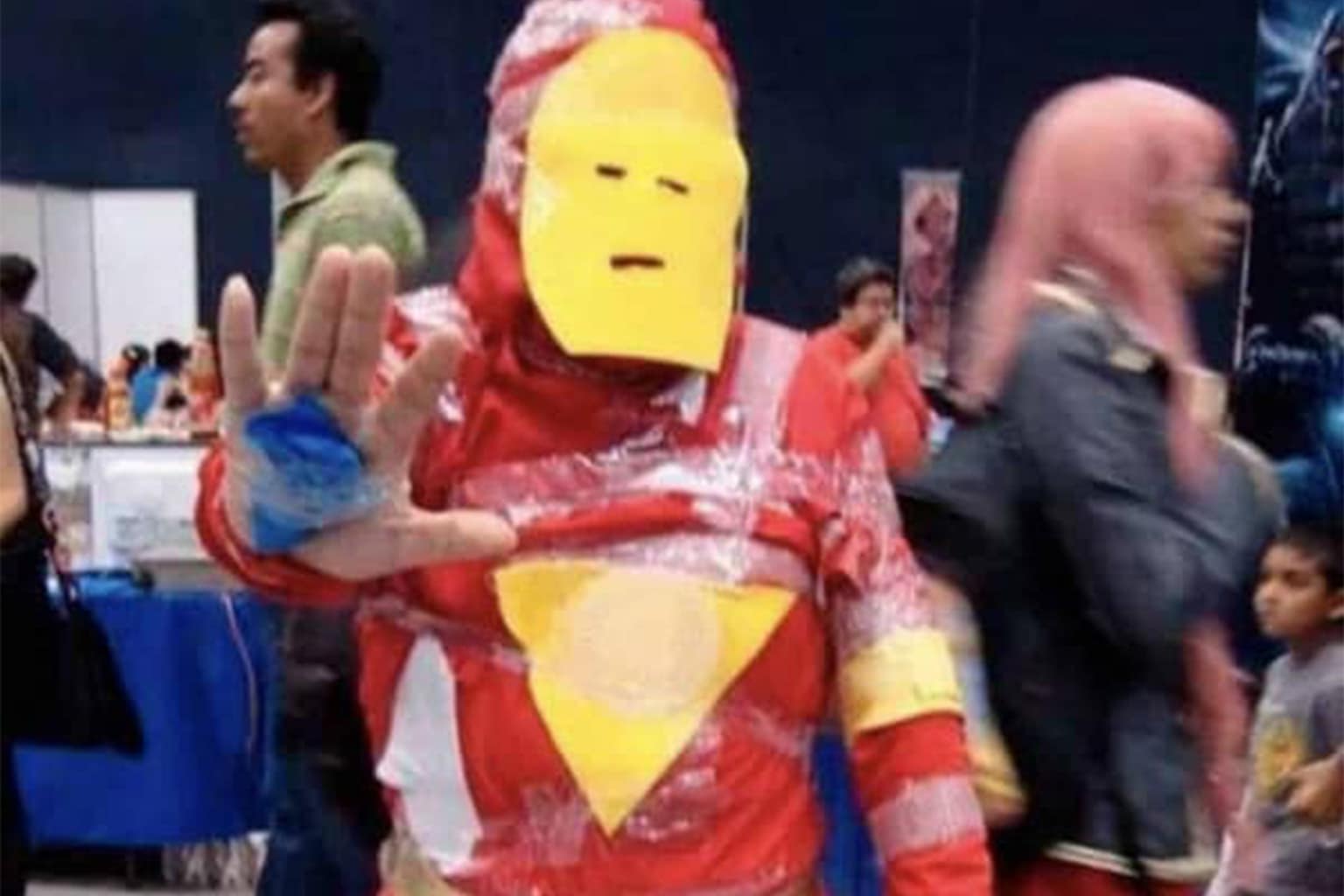 Exploring the chaotic world of cursed cosplay through a gallery featuring a nightmarish realistic Stitch, a man as a mermaid made of trash bags and brooms, and a budget Mandalorian with a bucket for a head.