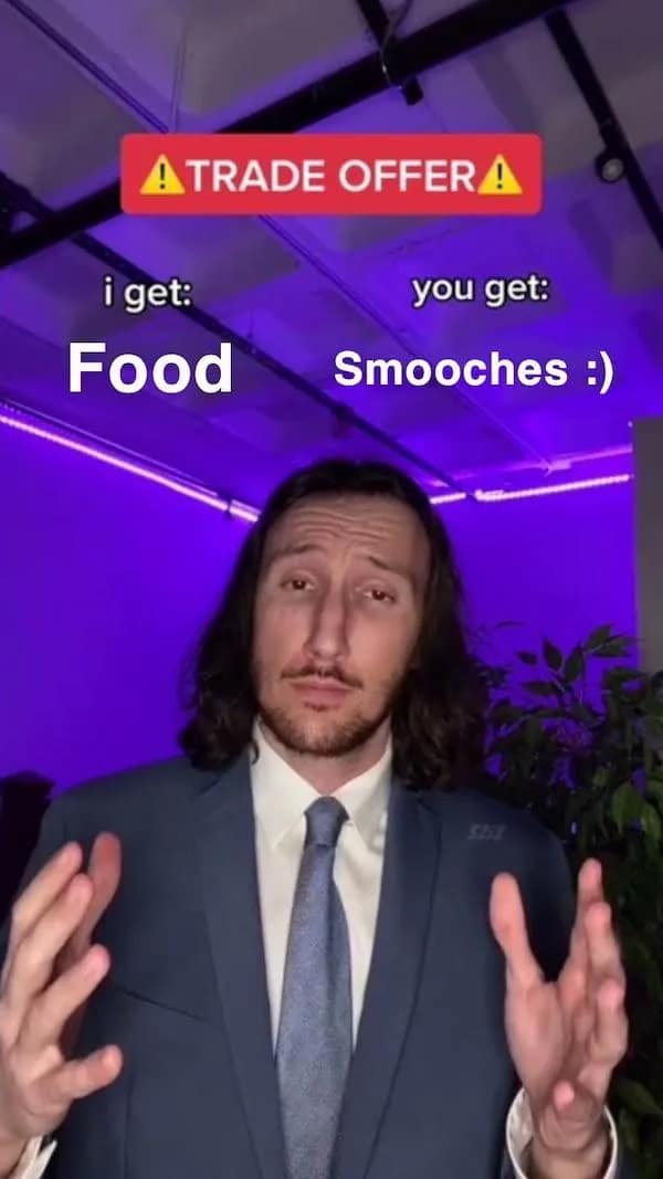 A flirty meme utilizing the "Trade Offer" template, proposing a high-stakes deal where one partner receives "food" and the other receives "smooches."