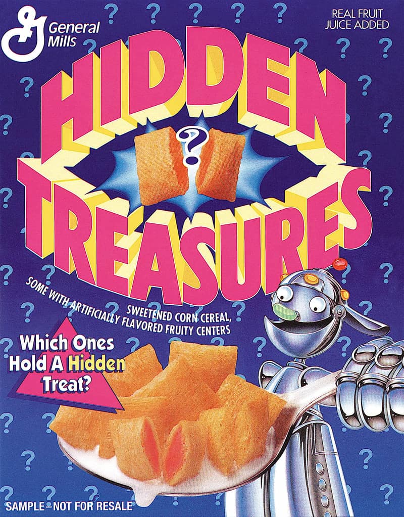 A purple box of General Mills Hidden Treasures sweetened corn cereal features a historic discontinued cereals concept, displaying a vintage metallic robot mascot pointing at squares with surprise fruity centers.