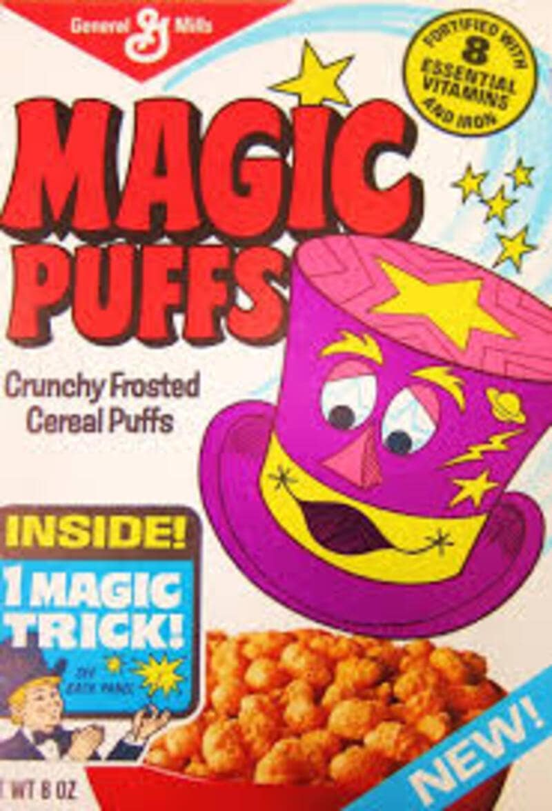 An old-school box of General Mills Magic Puffs crunchy frosted cereal puffs marks a rare find among discontinued cereals, featuring an animated purple magician top hat mascot and a free magic trick inside.