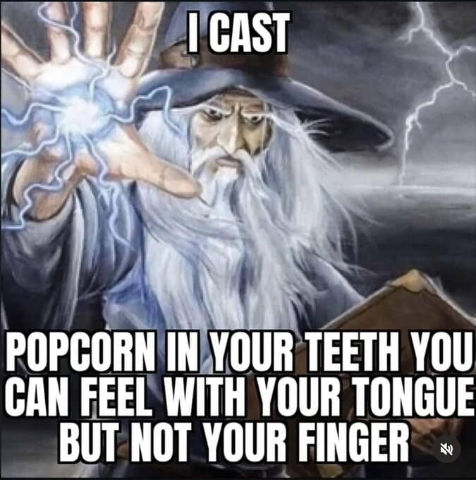 A stylized fantasy wizard card template delivers a chaotic curse in a viral dnd meme, displaying an old mage casting a psychic bolt that forces an annoying, phantom popcorn kernel to get permanently stuck in your teeth where it can only be felt by your tongue.