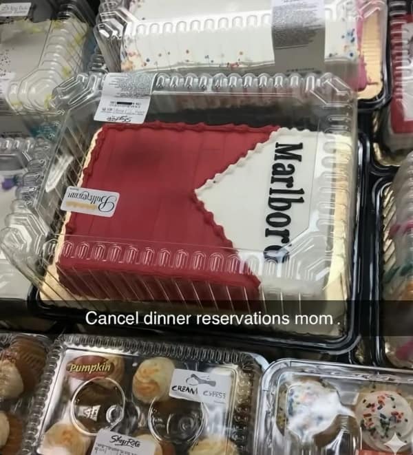 A grocery store sheet cake decorated to look exactly like a red and white pack of Marlboro cigarettes centers a funny food meme with a Snapchat caption reading "Cancel dinner reservations mom."