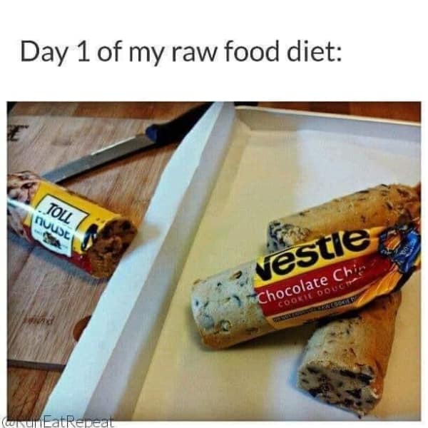 Slices of unbaked Nestle Toll House chocolate chip cookie dough logs rest on a wooden cutting board next to a chef's knife in a clever dessert meme celebrating day one of a raw food diet.
