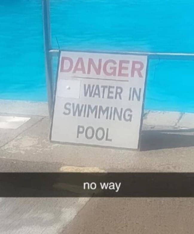 A swimming pool warning sign with a Snapchat caption reacting to the obvious message.