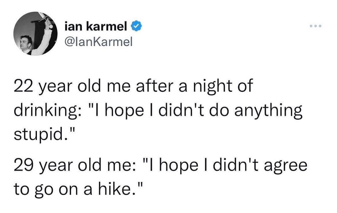 A relatable aging text layout operates as a popular funny hiking meme, comparing a 22-year-old’s hangover regrets about doing something stupid against a 29-year-old’s fear of accidentally agreeing to an outdoor excursion.