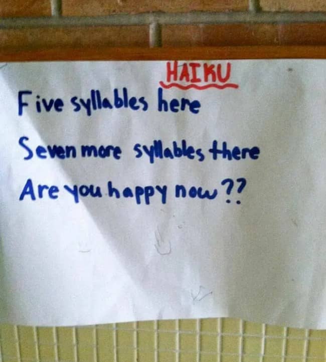 Sarcastic handwritten haiku poem on paper mocking the strict five seven five syllable structure.