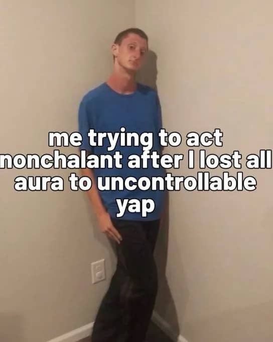 Man leaning against a wall with text about losing aura and trying to act nonchalant.