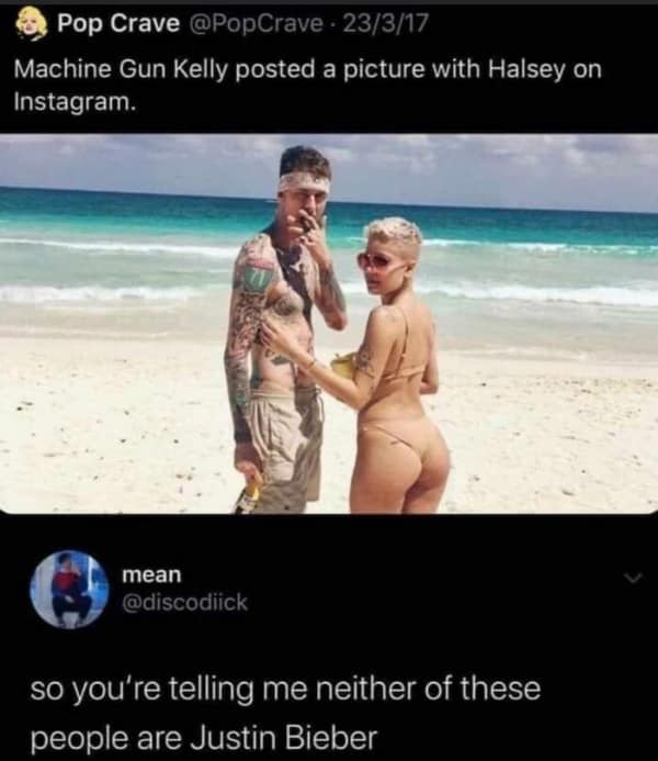 A Pop Crave social media post showing Machine Gun Kelly and Halsey posing on a beach. A commenter provides a funny roast by questioning if neither celebrity is actually just a variation of Justin Bieber.
