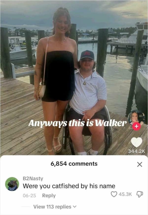 TikTok screenshot of a woman standing next to a man in a wheelchair with the text Anyway this is Walker. A commenter provides a funny insult asking if she was catfished by his name.