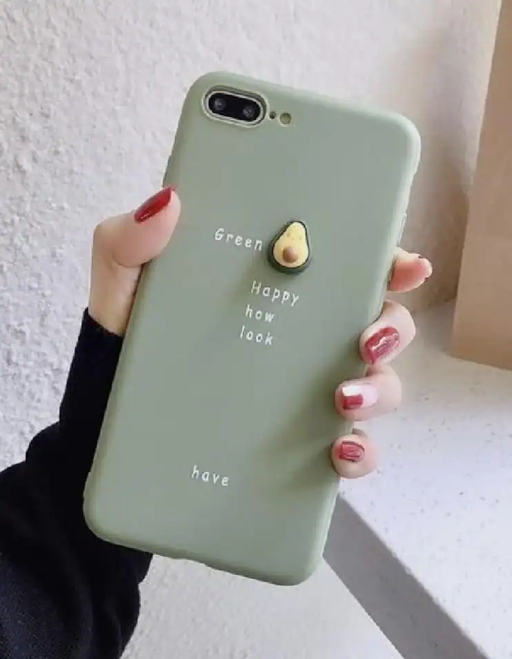 A pastel green phone case featuring a tiny avocado and random, broken English words.