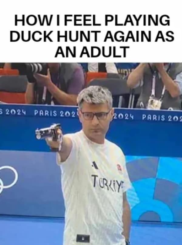 A gamer meme titled "How I feel playing Duck Hunt again as an adult," featuring the viral 2024 Olympic shooter Yusuf Dikeç aiming his pistol with extreme nonchalance.