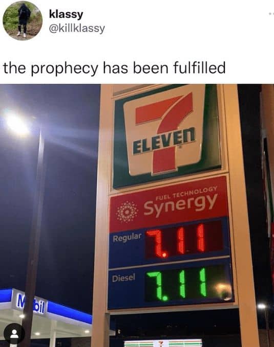 A 7-Eleven gas station sign showing regular and diesel prices both set at 7.11.