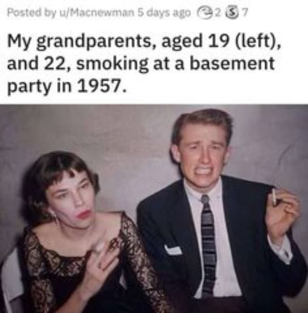 Vintage 1957 photo of a young couple smoking at a basement party.