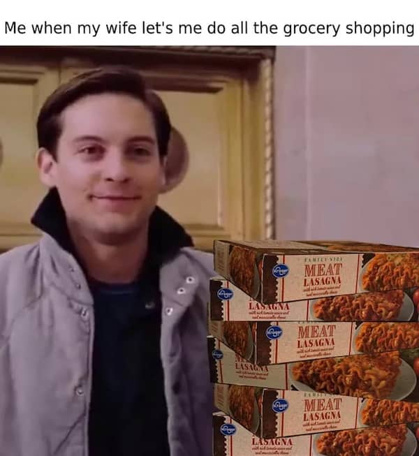 A meme featuring Tobey Maguire smiling next to a massive stack of frozen meat lasagnas.