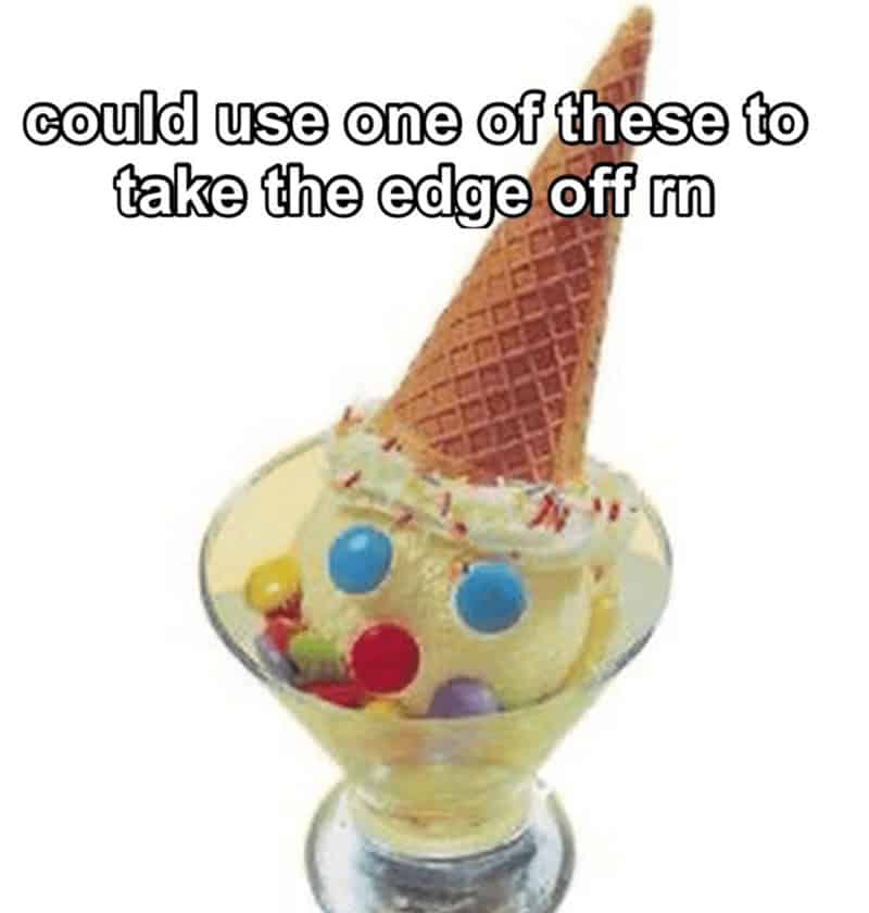 A sad-looking clown-faced sundae in a glass bowl used as a "take the edge off" ice cream meme.