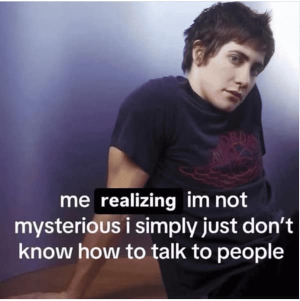 introvert meme with a photo of a young Jake Gyllenhaal looking contemplative and slightly awkward. The caption reads: "me realizing im not mysterious i simply just don't know how to talk to people."
