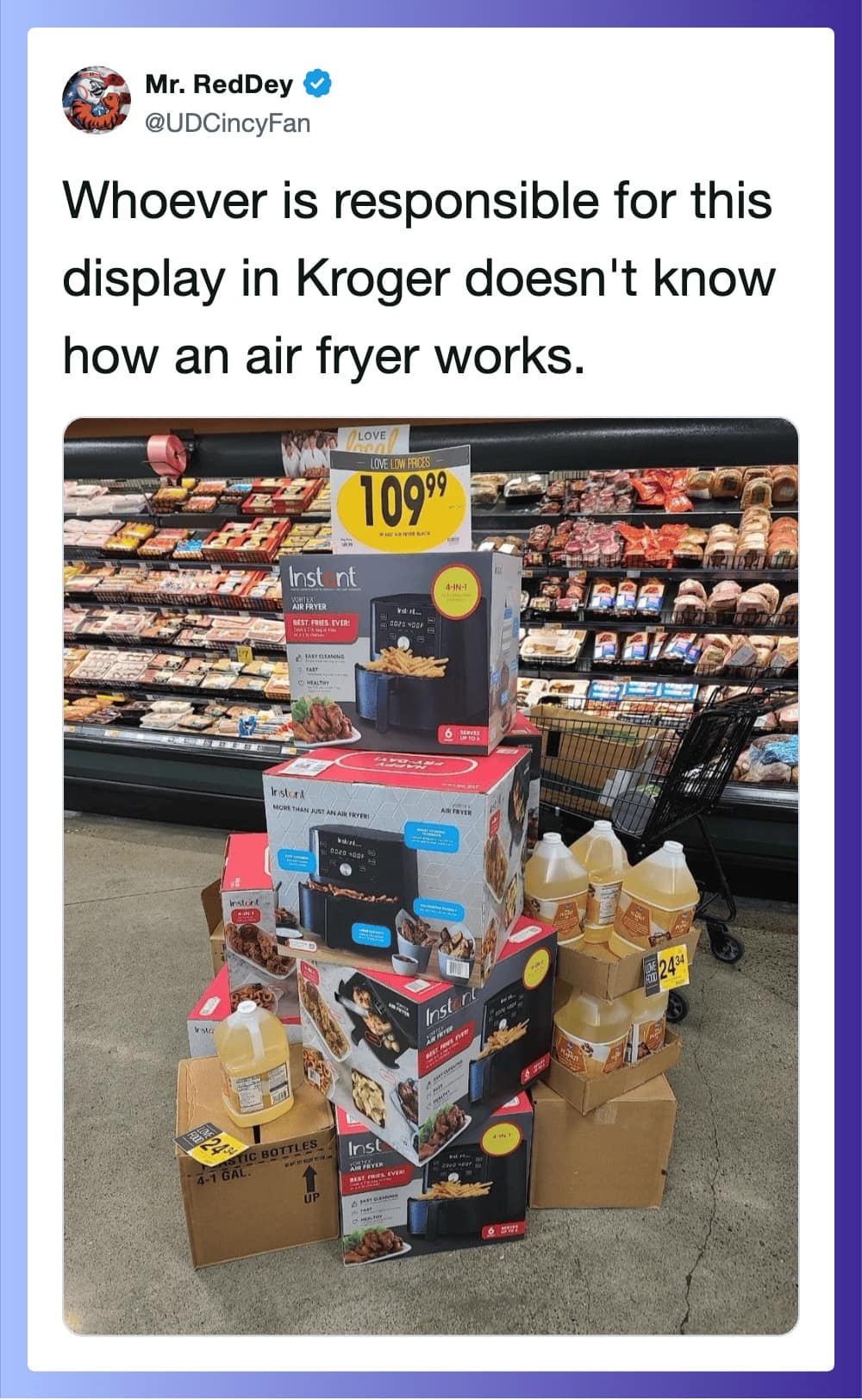 A hilarious grocery store display photo in a meme dump captures a stack of oil-less air fryers ironically surrounded by bulk jugs of liquid peanut frying oil at a Kroger supermarket.