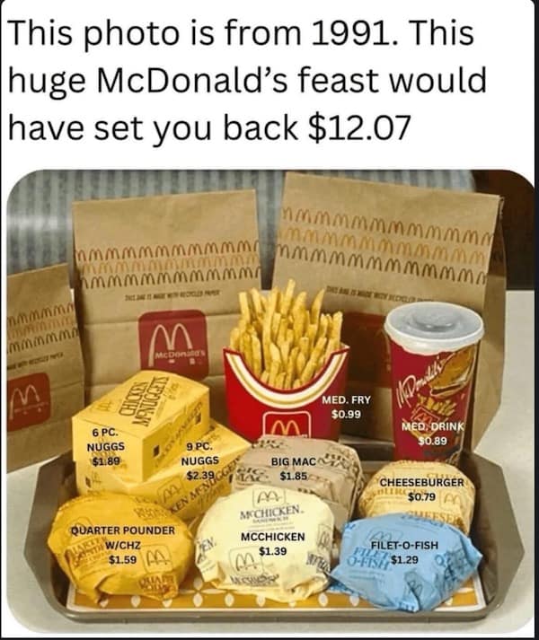 A vintage tray from a 1991 McDonald's feast reveals an itemized pricing spread where a Big Mac, Quarter Pounder, and multiple orders of McNuggets cost a total of $12.07 in a popular funny meme about inflation.