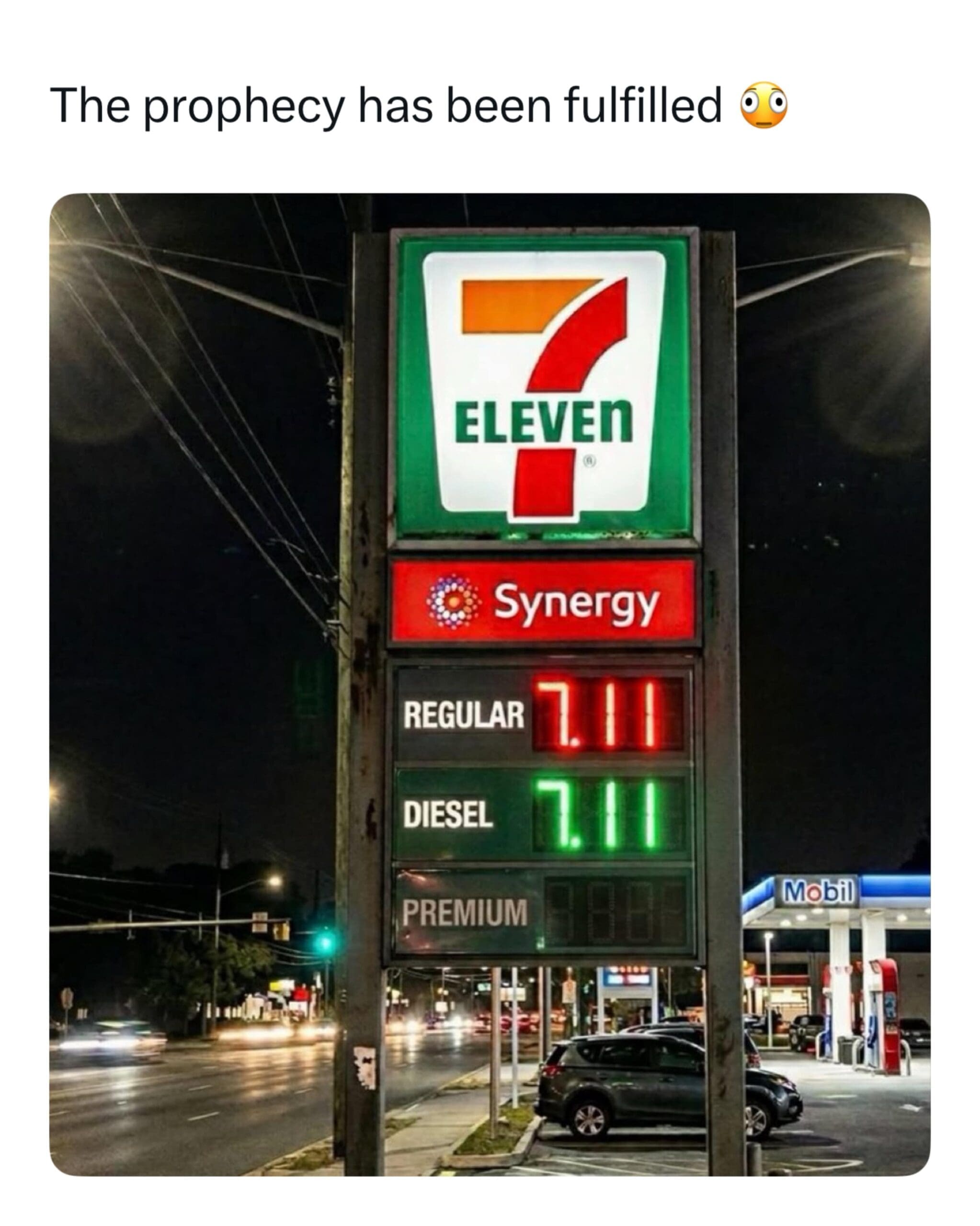 A "prophecy fulfilled" funny meme of a 7-Eleven gas station sign where the price for both regular and diesel fuel is displayed as exactly $7.11.