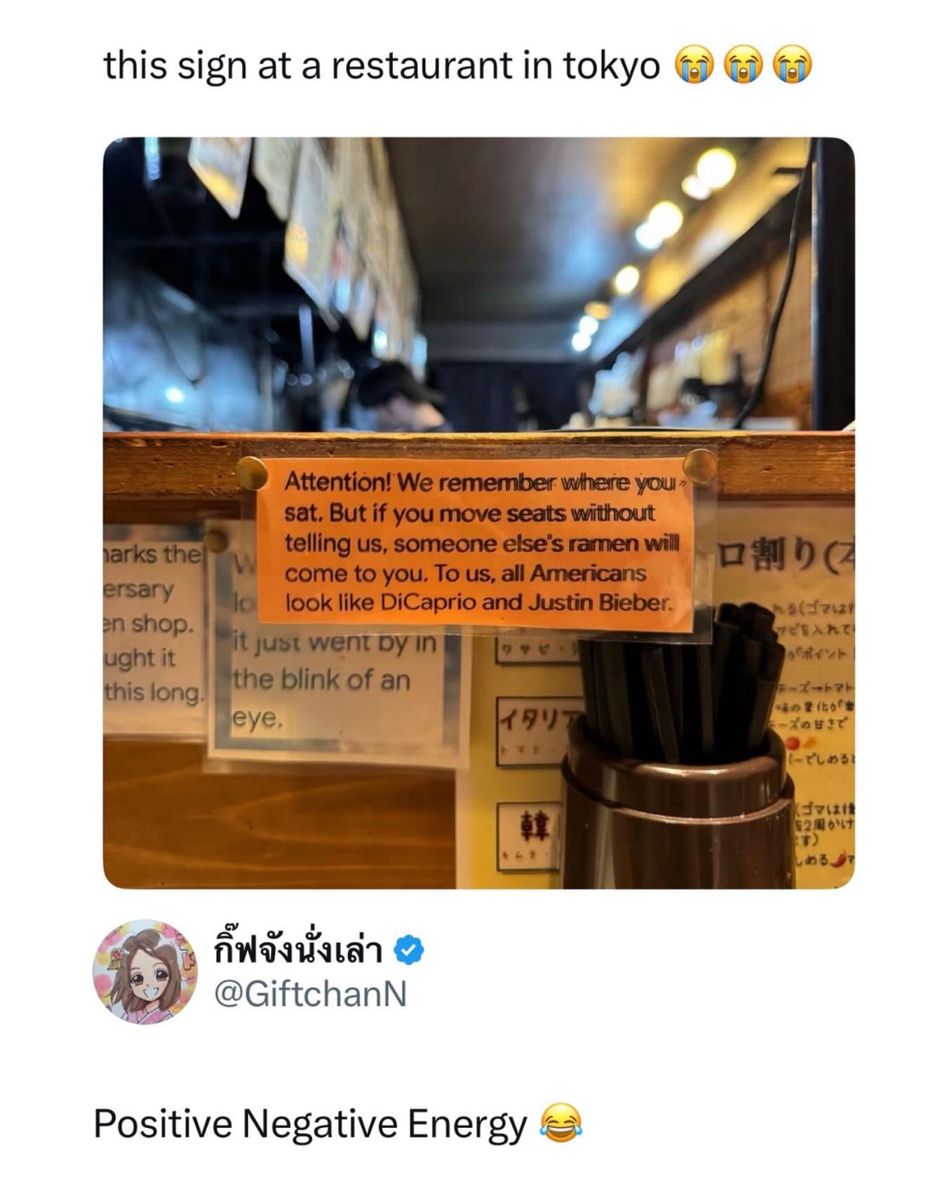 A viral funny meme showing a sign in a Tokyo restaurant warning Americans not to switch seats because to the staff, all Americans look like Leonardo DiCaprio or Justin Bieber.
