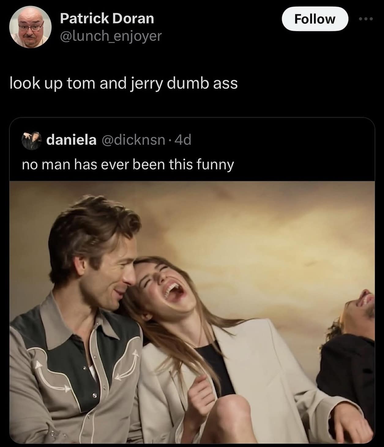 Hollywood actors Glen Powell and Daisy Edgar-Jones laughing hysterically during a promotional press interview are quote-tweeted with a blunt reminder to look up Tom and Jerry, anchoring a viral meme dump about celebrity media tours.