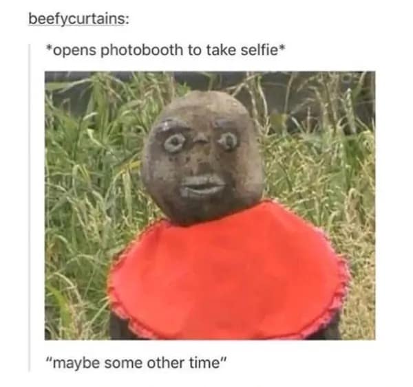 A self-deprecating funny meme showing a cursed, handmade mud-man figure with wide, panicked googly eyes, representing the horror of accidentally opening the front-facing camera for a selfie.