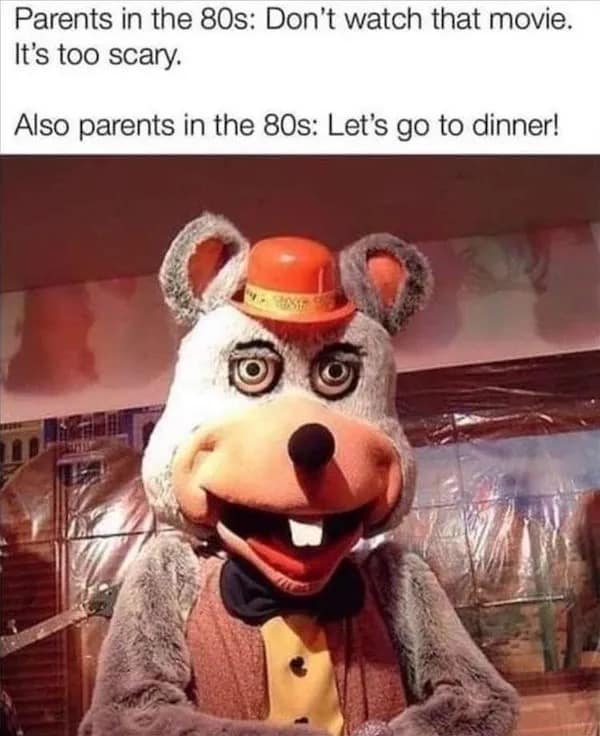 The creepy animatronic Chuck E. Cheese rat mascot stares blankly under text highlighting the wild hypocrisy of 1980s parents banning scary movies but taking kids to nightmare-inducing pizza arcades.