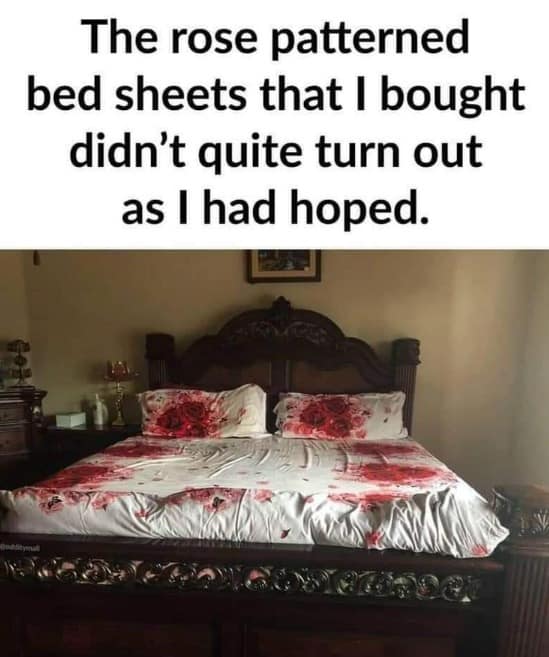 A bedroom photo features a large wooden bed dressed in white sheets printed with red rose splatters that unfortunately look exactly like a gruesome crime scene, anchoring a popular funny meme about terrible home decor products.