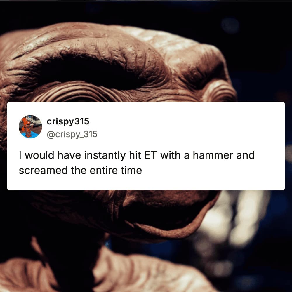 A movie meme featuring a close-up screenshot of E.T.'s wrinkled brown face from the classic sci-fi film, overlaid with a tweet from a user admitting that they would have immediately hit the alien with a hammer while screaming.