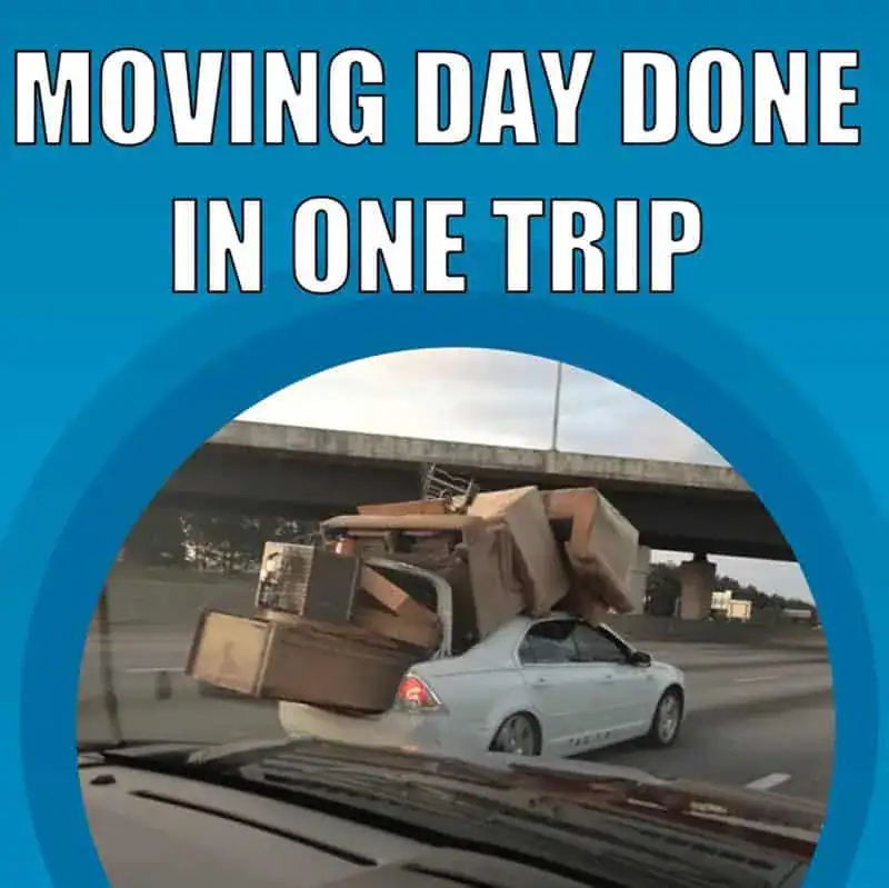 A white car dangerously overloaded with furniture and boxes driving on a highway.