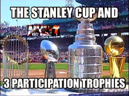 : Sports meme showing the massive Stanley Cup trophy next to three smaller professional sports trophies.