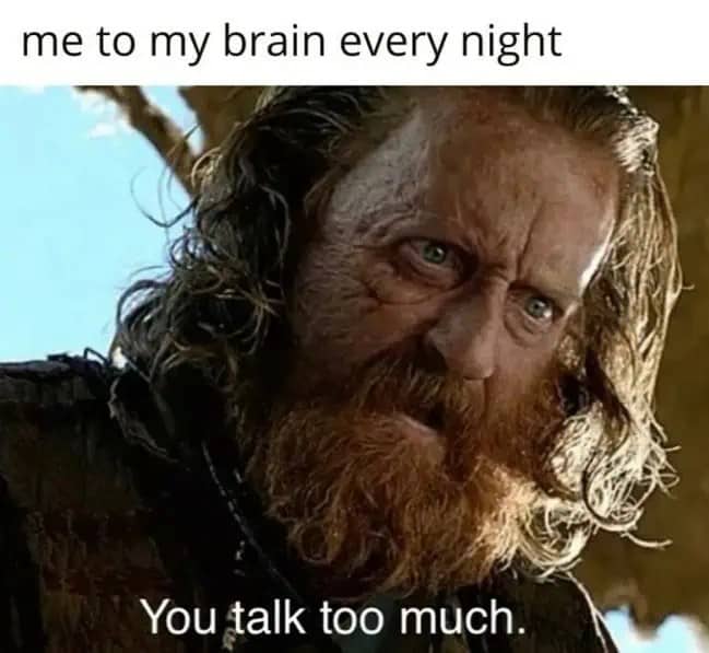 A rugged man with a beard saying "You talk too much" to represent late-night overthinking.