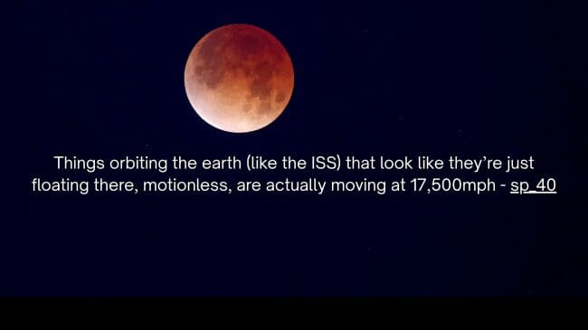 A high-contrast blood moon eclipse hanging in a black sky frames an orbital velocity space fact by sp_40 explaining that objects floating motionless around Earth are actually moving at 17,500 mph.