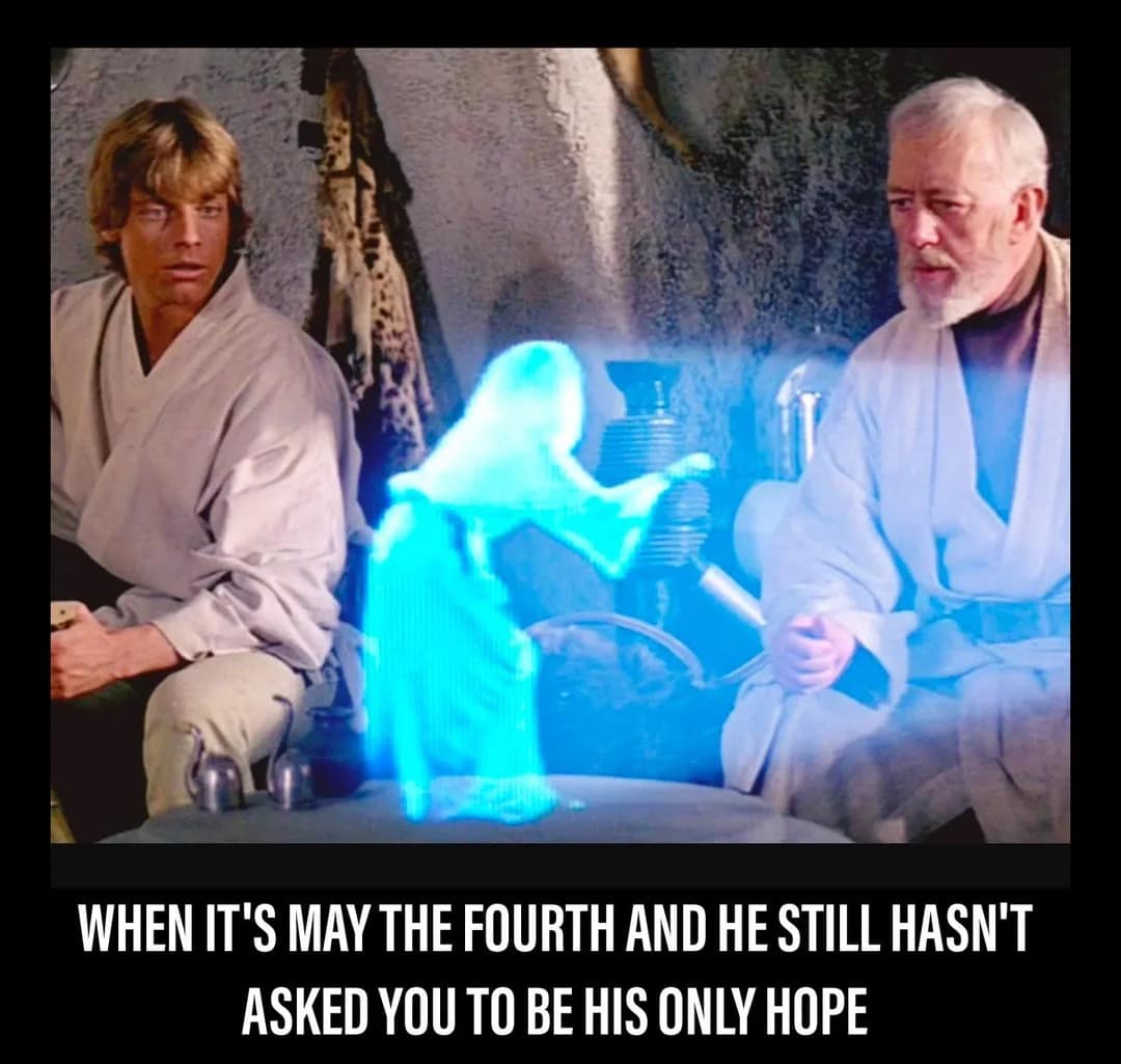 Princess Leia’s iconic holographic message to Obi-Wan is used in this May the 4th be with you meme about relationship expectations. The text jokes about waiting to be called someone's only hope on the holiday.