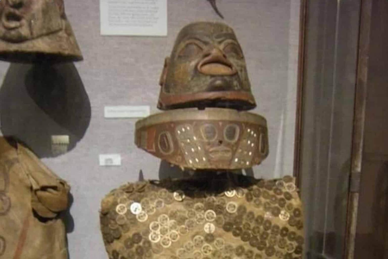 A text and visual weird history archive gallery showcasing timeline-shattering facts, including a Native American suit of armor crafted entirely out of salvaged Chinese coins, the bizarre reality that France was still using the guillotine when Star Wars was in theaters, and Operation Starfish Prime's accidental nuclear EMP blackout of Hawaii.