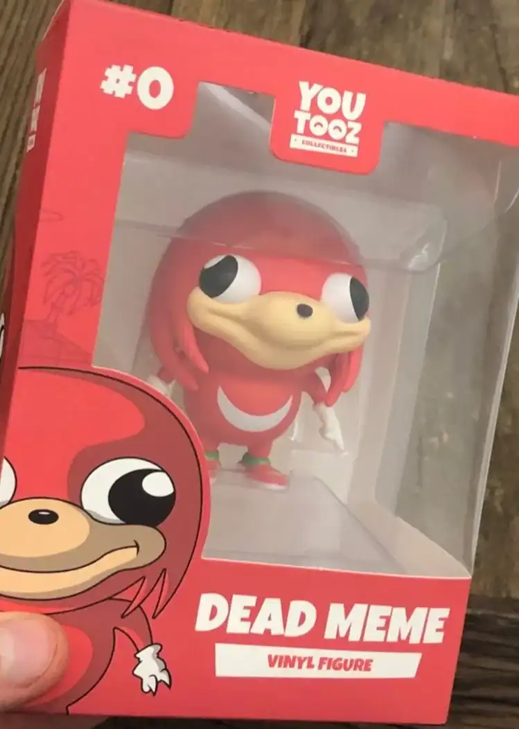 A retail box for a "Dead Meme" vinyl figure by Youtooz, featuring the "Ugandan Knuckles" red character, serving as a physical relic of a bygone internet era.