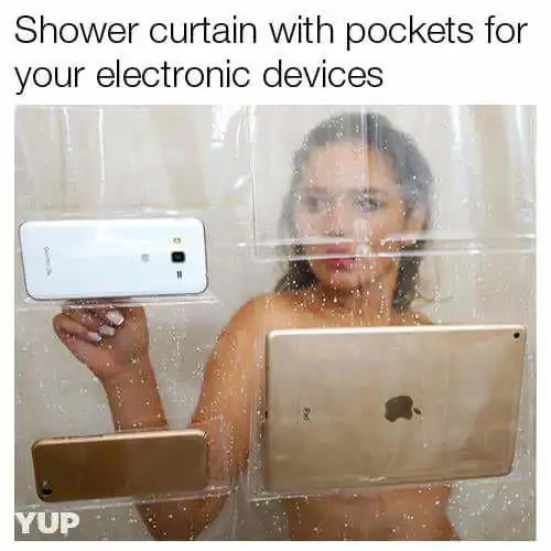 A contemporary weird product consisting of a clear plastic shower curtain featuring multiple waterproof pockets designed to hold smartphones and tablets at eye level.