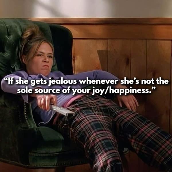 A brooding Rory Gilmore slumped in a green armchair highlights a toxic behavior in this women share red flags gallery about partners who get jealous whenever they aren't the absolute and only source of your joy.