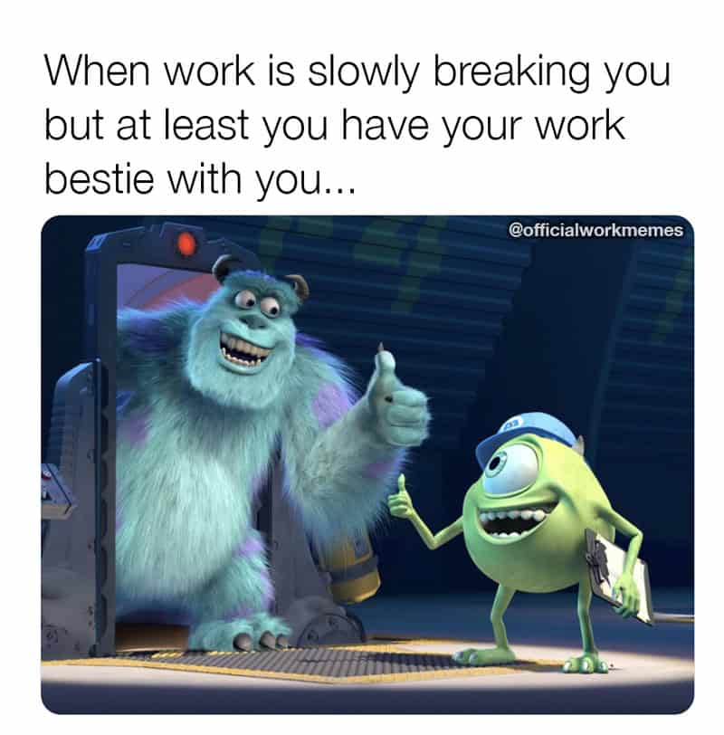 A heartwarming but weary work meme using a still from Monsters, Inc. showing Sulley and Mike Wazowski giving tired but supportive thumbs-up to each other while standing in a doorway. The text celebrates having a "work bestie" to lean on when the job is slowly breaking your spirit.