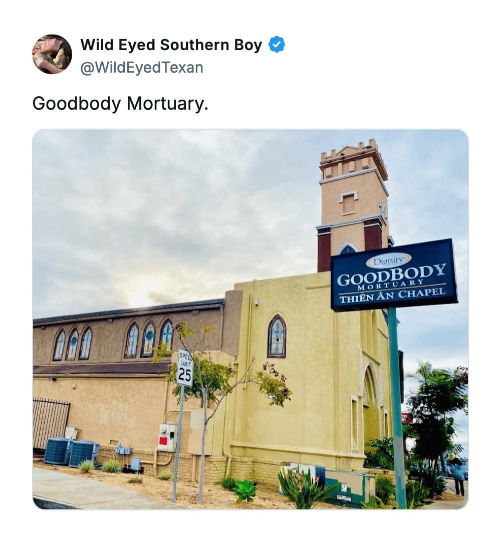 A photo of the "Goodbody Mortuary" sign in front of a large chapel, securing its spot as one of the worst business names for the unsettling irony of promising a "good body" at a funeral home.