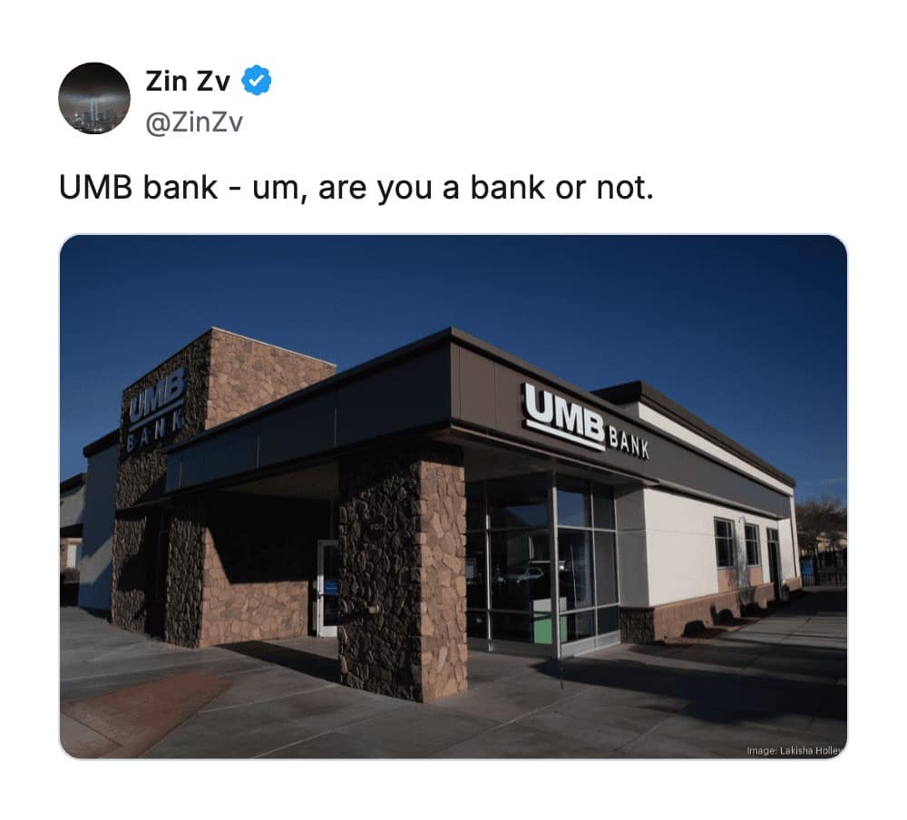 A modern commercial building for "UMB Bank," mocked as one of the worst business names because the acronym makes it sound like the company is constantly questioning its own identity ("Um... B-Bank?").