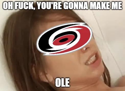 A classic adult film reaction template transformed into a 2026 Stanley Cup Finals meme features the Carolina Hurricanes logo overlaid on a woman's face with an ecstatic caption reading, "OH F*CK, YOU'RE GONNA MAKE ME OLE."